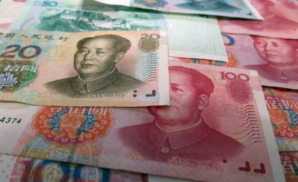 Bancos chinos registran menores ganancias por préstamos incobrables