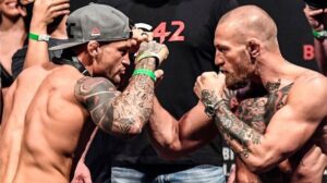 Dustin Poirier y Conor McGregor, en el careo del UFC 257, el viernes 22 de enero de 2021.