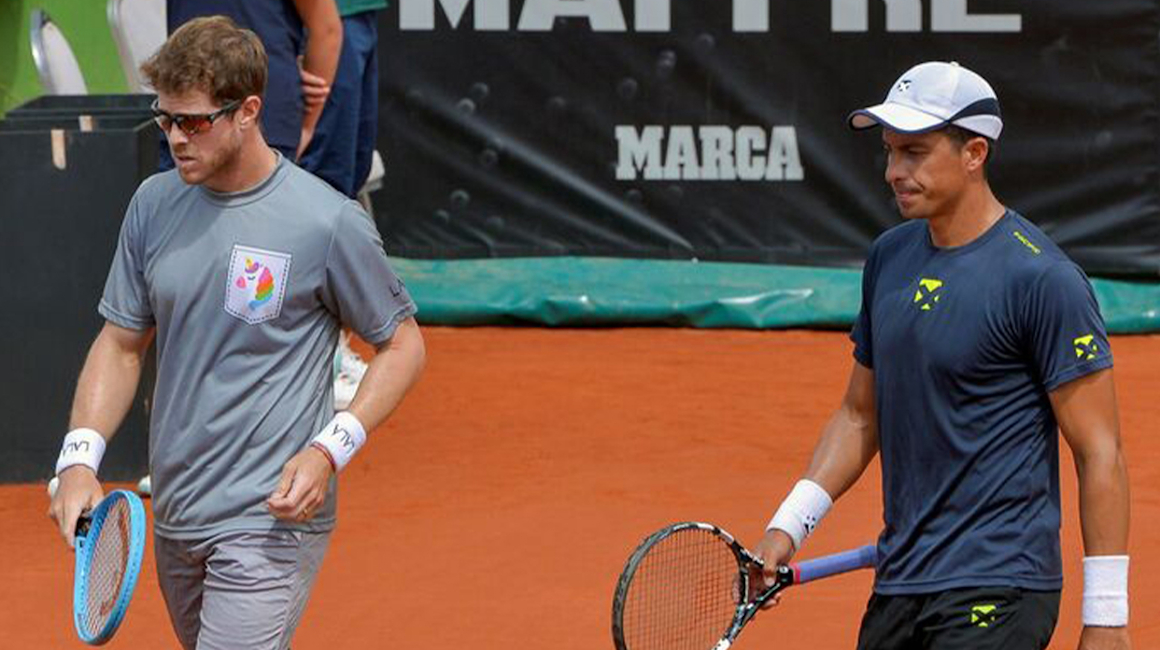 Ariel Behar (izq) y Gonzalo Escobar (der) durante el ATP 250 de Ginebra, en mayo de 2021.