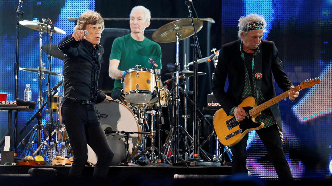Mick Jagger (L), Charlie Watts (C) and Keith Richards durante un concierto en Abu Dhabi. 21 de febrero de 2014.