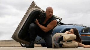 Actors vin diesel and daniela melchior in a scene from 'fast and furious x'.